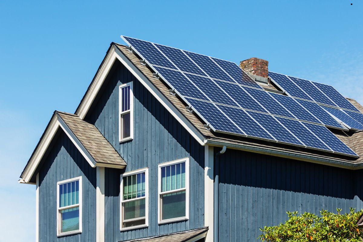 Solar panels installed on a residential roof, showcasing sustainable energy solutions for modern homes.